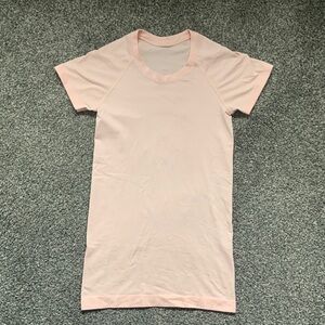 Lululemon baby pink short sleeve athletic shirt size 2